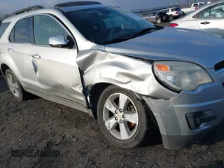 2014 Chevrolet Equinox LT z VIN 2GNALBEK9E6162281, wystawiony jako IAAI lot #41545223 z przebiegiem 170 151 mil mil oraz . Historia ofert i sprzedaży dostępna na DreamBid. Obrazek 6.