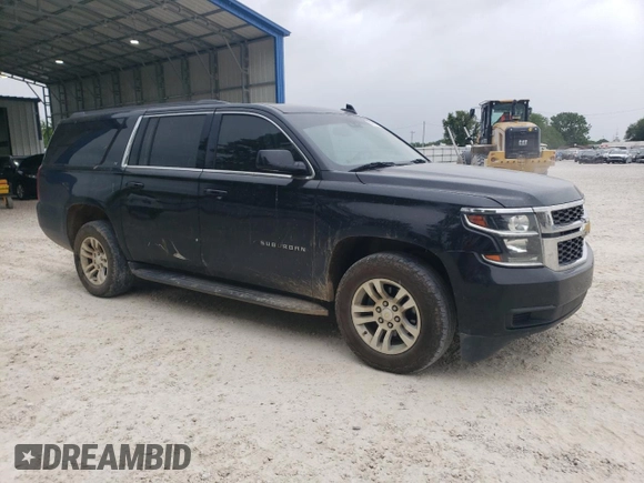 2018 Chevrolet Suburban LT with VIN 1GNSCHKC8JR331662, listed as a Copart auction lot 55561545 with 164,213 mi miles and Salvage title. Bid and sale history available at DreamBid. Image 4.