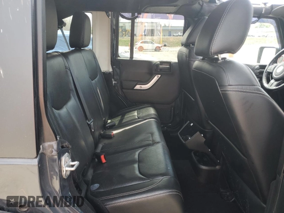 2017 Jeep Wrangler Unlimited Sahara with VIN 1C4BJWEG5HL707569, listed as a Copart auction lot 51326015 with 95,816 mi miles and Salvage title. Bid and sale history available at DreamBid. Image 10.
