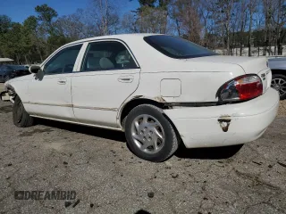 2001 Mazda 626 LX with VIN 1YVGF22C815240640, listed as a Copart auction lot 47609315 with 0 mi miles and Salvage Title. Bid and sale history available at carsss.com. Image 2.