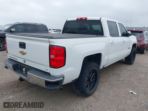 2018 Chevrolet Silverado 1500 LT with VIN 3GCPCREC7JG402401, listed as a IAAI auction lot 41880462 with 128,995 mi miles and . Bid and sale history available at DreamBid. Image 4.