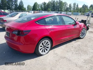 2022 Tesla Model 3 Long Range z VIN 5YJ3E1EB5NF174606, wystawiony jako IAAI lot #42463894 z przebiegiem 36 677 mil mil oraz . Historia ofert i sprzedaży dostępna na DreamBid. Obrazek 4.