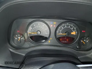 2014 Jeep Patriot Latitude with VIN 1C4NJRFB0ED852882, listed as a Copart auction lot 49674915 with 130,367 mi miles and Salvage title. Bid and sale history available at DreamBid. Image 9.