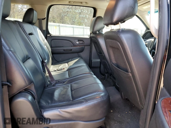 2014 Chevrolet Suburban LT with VIN 1GNSCJE01ER117627, listed as a Copart auction lot 46075985 with 258,564 mi miles and Salvage Title. Bid and sale history available at carsss.com. Image 12.