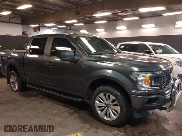 2018 Ford F-150 XL with VIN 1FTEW1EP5JFC37436, listed as a IAAI auction lot 41807561 with 133,159 mi miles and . Bid and sale history available at carsss.com. Image 1.