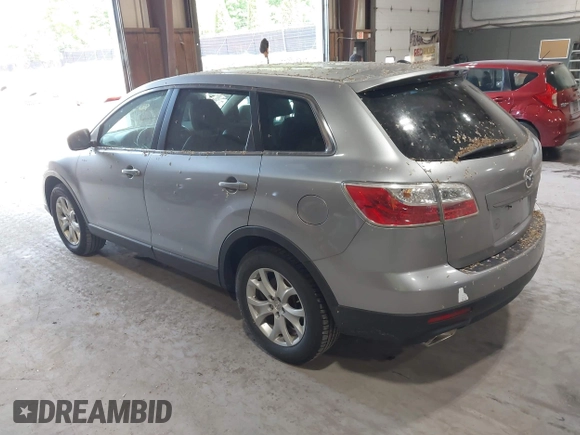 2011 Mazda CX-9 Touring with VIN JM3TB3CV2B0331219, listed as a IAAI auction lot 42408797 with 115,377 mi miles and . Bid and sale history available at DreamBid. Image 3.