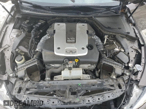 2015 Infiniti Q50 Premium z VIN JN1BV7AP5FM353448, wystawiony jako Copart lot #57115325 z przebiegiem 104 721 mil mil oraz Szkoda całkowita • Salvage title. Historia ofert i sprzedaży dostępna na DreamBid. Obrazek 11.