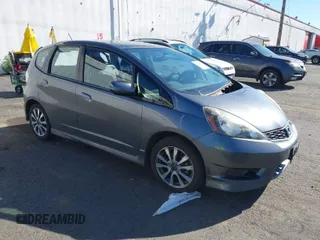 2013 Honda Fit Sport with VIN JHMGE8H58DC045219, listed as a IAAI auction lot 42057466 with 121,837 mi miles. Bid and sale history available at carsss.com. Image 1.