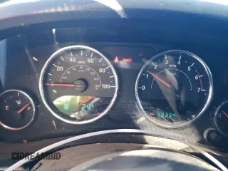2011 Jeep Wrangler Rubicon with VIN 1J4BA6D15BL563410, listed as a Copart auction lot 76973964 with 68,334 mi miles and Salvage title. Bid and sale history available at DreamBid. Image 9.