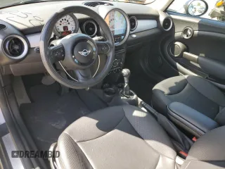 2013 MINI Hardtop with VIN WMWSU3C57DT678736, listed as a Copart auction lot 52586285 with 64,563 mi miles and Salvage Title. Bid and sale history available at DreamBid. Image 8.