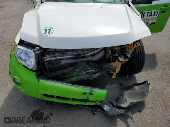 2010 Ford Escape Hybrid with VIN 1FMCU4K37AKB24879, listed as a Copart auction lot 77931024 with Not provided miles and Non repairable. Bid and sale history available at DreamBid. Image 11.