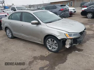 2015 Volkswagen Jetta Sedan 1.8T SE w/Connectivity with VIN 3VWD07AJ9FM326125, listed as a IAAI auction lot 41531163 with 141,284 mi miles. Bid and sale history available at carsss.com. Image 1.