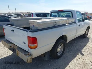 1996 Ford Ranger z VIN 1FTCR10U4TPB33433, wystawiony jako IAAI lot #41469888 z przebiegiem 118 900 mil mil oraz . Historia ofert i sprzedaży dostępna na DreamBid. Obrazek 4.