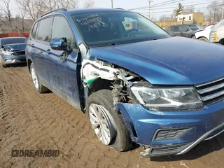 2018 Volkswagen Tiguan S with VIN 3VV1B7AX6JM108786, listed as a IAAI auction lot 41708099 with 162,289 mi miles and . Bid and sale history available at DreamBid. Image 6.