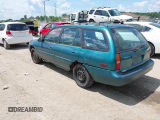 1997 Ford Escort LX with VIN 3FALP15P5VR126145, listed as a IAAI auction lot 42637921 with 148,109 mi miles and . Bid and sale history available at DreamBid. Image 3.
