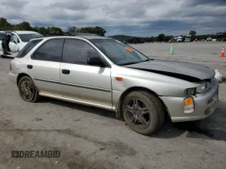 1999 Subaru Impreza L with VIN JF1GF4351XH815210, listed as a Copart auction lot 71250504 with 141,806 mi miles and Salvage title. Bid and sale history available at DreamBid. Image 4.