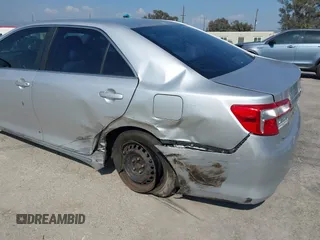 2012 Toyota Camry L z VIN 4T1BF1FKXCU009416, wystawiony jako IAAI lot #42136155 z przebiegiem 222 244 mil mil oraz . Historia ofert i sprzedaży dostępna na DreamBid. Obrazek 6.