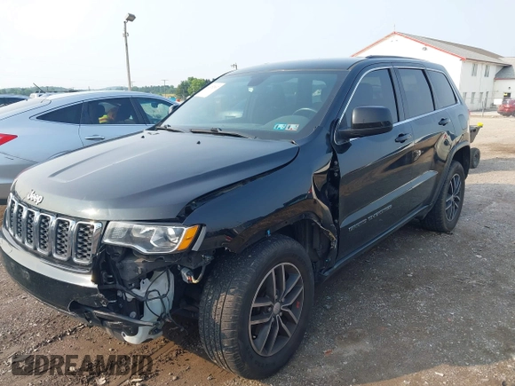 2017 Jeep Grand Cherokee Laredo with VIN 1C4RJFAG0HC706155, listed as a IAAI auction lot 42452967 with 144,925 mi miles and . Bid and sale history available at DreamBid. Image 6.
