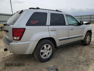 2009 Jeep Grand Cherokee Laredo with VIN 1J8GR48K89C500719, listed as a Copart auction lot 51425085 with 127,896 mi miles and Salvage Title. Bid and sale history available at carsss.com. Image 3.
