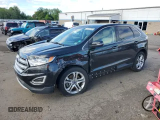 2015 Ford Edge Titanium z VIN 2FMTK4K86FBB88124, wystawiony jako Copart lot #57392305 z przebiegiem 95 698 mil mil oraz Szkody całkowita. Historia ofert i sprzedaży dostępna na DreamBid. Obrazek 1.