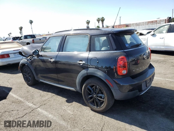 2016 MINI Countryman with VIN WMWZB3C58GWR47074, listed as a Copart auction lot 57174885 with 83,062 mi miles and Salvage title. Bid and sale history available at DreamBid. Image 2.