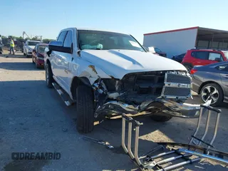 2014 Ram 1500 Big Horn with VIN 1C6RR6LT9ES293146, listed as a IAAI auction lot 42221136 with 230,866 mi miles and . Bid and sale history available at DreamBid. Image 1.