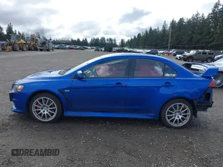 2015 Mitsubishi Lancer Evolution GSR with VIN JA32W8FV4FU012578, listed as a IAAI auction lot 41730742 with 64,762 mi miles. Bid and sale history available at carsss.com. Image 15.