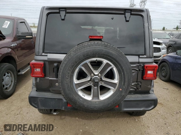 2018 Jeep Wrangler Unlimited Sahara with VIN 1C4HJXEN7JW295223, listed as a Copart auction lot 57385265 with 29,662 mi miles and Salvage title. Bid and sale history available at DreamBid. Image 6.