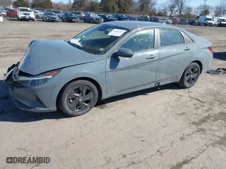 2022 Hyundai Elantra Hybrid Blue with VIN KMHLM4AJ1NU032127, listed as a IAAI auction lot 41641315 with 50,822 mi miles. Bid and sale history available at carsss.com. Image 18.