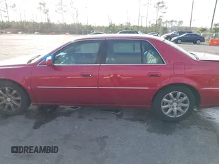 2008 Cadillac DTS 1SA z VIN 1G6KD57Y68U165791, wystawiony jako IAAI lot #41579605 z przebiegiem 94 451 mil mil oraz . Historia ofert i sprzedaży dostępna na DreamBid. Obrazek 14.