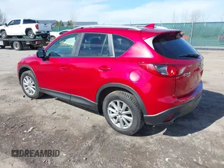 2016 Mazda CX-5 Touring with VIN JM3KE4CY5G0816285, listed as a IAAI auction lot 41888537 with 101,598 mi miles. Bid and sale history available at carsss.com. Image 3.