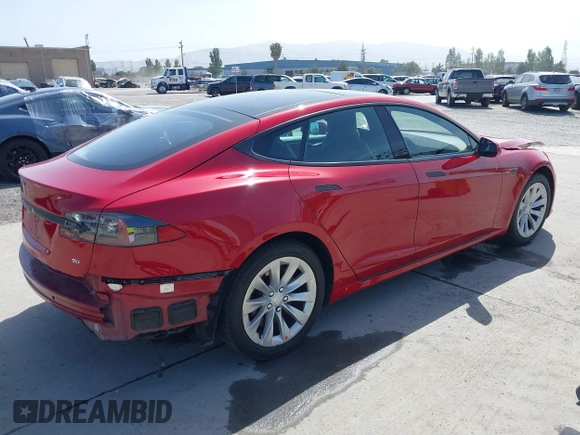 2016 Tesla Model S 70 with VIN 5YJSA1E17GF152401, listed as a IAAI auction lot 42272384 with 65,698 mi miles and . Bid and sale history available at DreamBid. Image 4.