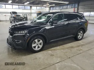2023 Kia Sorento LX z VIN 5XYRG4LC7PG163684, wystawiony jako Copart lot #53855285 z przebiegiem 76 209 mil mil oraz Szkoda całkowita • Salvage title. Historia ofert i sprzedaży dostępna na DreamBid. Obrazek 1.