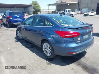 2018 Ford Focus Titanium with VIN 1FADP3J21JL323767, listed as a IAAI auction lot 42375218 with 104,440 mi miles and . Bid and sale history available at DreamBid. Image 3.