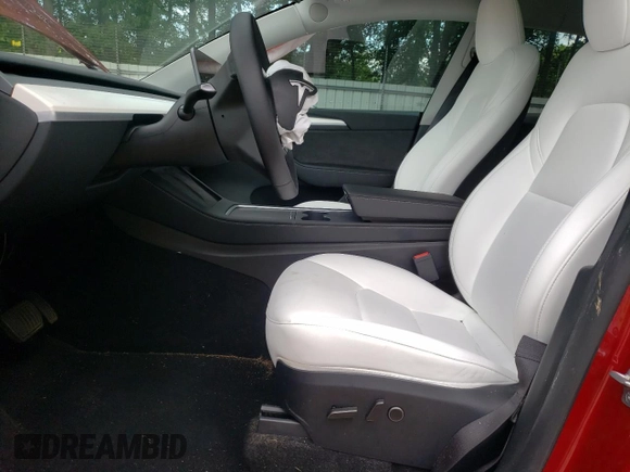 2024 Tesla Model Y Long Range with VIN 7SAYGDEE2RA269884, listed as a Copart auction lot 56937585 with 49,374 mi miles and Salvage title. Bid and sale history available at DreamBid. Image 7.