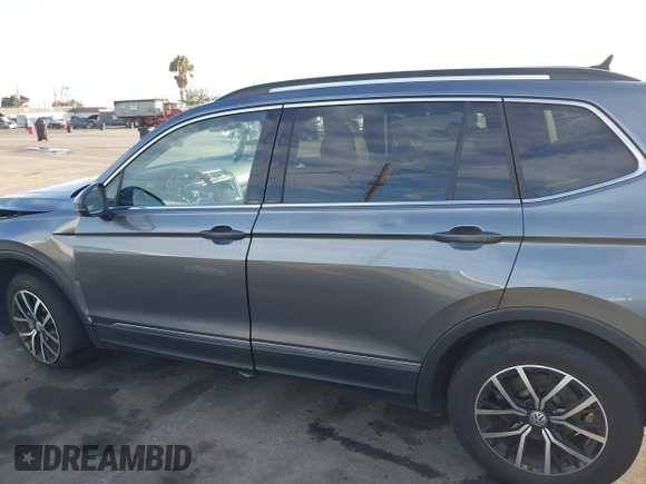 2021 Volkswagen Tiguan SE with VIN 3VV3B7AX8MM071303, listed as a IAAI auction lot 41109686 with 40,684 mi miles and . Bid and sale history available at DreamBid. Image 14.