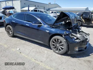 2014 Tesla Model S 60 with VIN 5YJSA1H13EFP38425, listed as a Copart auction lot 54156245 with 183,968 mi miles and Salvage title. Bid and sale history available at DreamBid. Image 4.