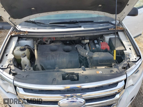 2014 Ford Edge SE z VIN 2FMDK3G96EBA14925, wystawiony jako Copart lot #87165534 z przebiegiem 185 731 mil mil oraz Szkoda całkowita • Salvage title. Historia ofert i sprzedaży dostępna na DreamBid. Obrazek 12.