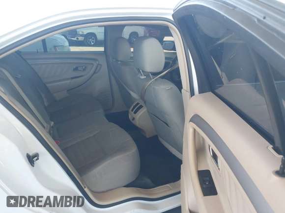 2014 Ford Taurus SE с VIN 1FAHP2D8XEG170512, выставлен на аукционе IAAI как лот 42142683 с пробегом 198 526 миль миль и . История ставок и продаж доступна на DreamBid. Изображение 8.