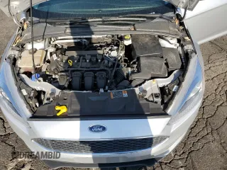 2018 Ford Focus SE z VIN 1FADP3F26JL278091, wystawiony jako Copart lot #63879875 z przebiegiem 81 984 mil mil oraz Czysty tytuł • Clean title. Historia ofert i sprzedaży dostępna na DreamBid. Obrazek 11.