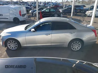 2015 Cadillac CTS AWD z VIN 1G6AW5SX2F0104981, wystawiony jako IAAI lot #41276740 z przebiegiem 87 128 mil mil oraz . Historia ofert i sprzedaży dostępna na DreamBid. Obrazek 14.