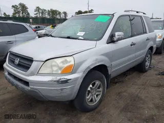 2003 Honda Pilot EX with VIN 2HKYF18413H554881, listed as a IAAI auction lot 41927719 with 999,999 mi miles. Bid and sale history available at carsss.com. Image 2.