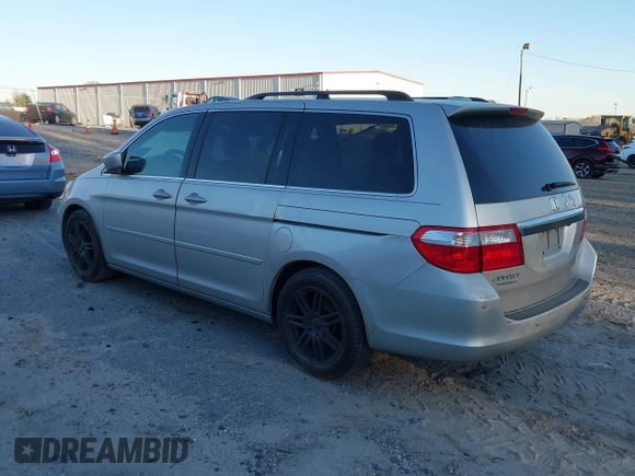 2006 Honda Odyssey Touring z VIN 5FNRL38856B098897, wystawiony jako IAAI lot #41251740 z przebiegiem 258 408 mil mil oraz . Historia ofert i sprzedaży dostępna na DreamBid. Obrazek 3.