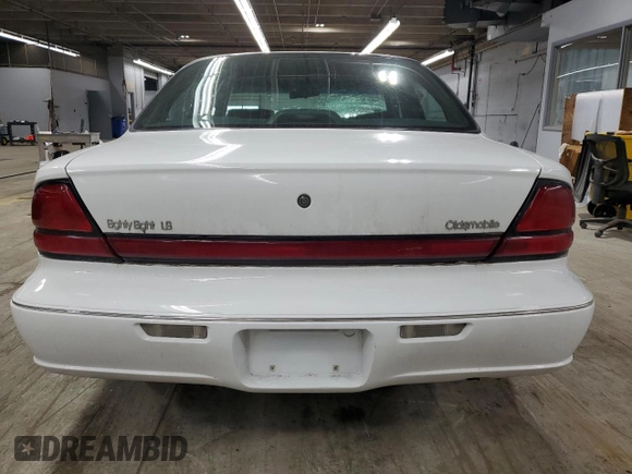 1998 Oldsmobile 88 LS z VIN 1G3HN52K9W4823866, wystawiony jako Copart lot #49150535 z przebiegiem 54 125 mil mil oraz Szkody całkowita. Historia ofert i sprzedaży dostępna na DreamBid. Obrazek 6.