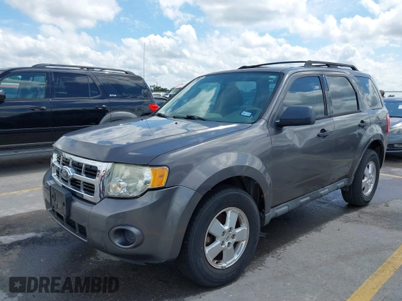2012 Ford Escape XLS with VIN 1FMCU0C75CKA40329, listed as a IAAI auction lot 42494805 with 223,218 mi miles and . Bid and sale history available at DreamBid. Image 2.