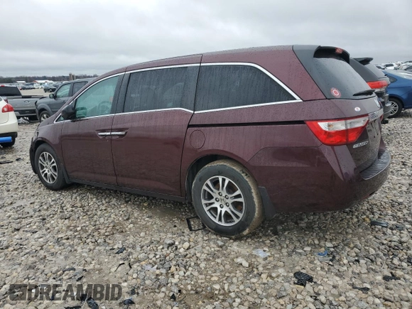 2012 Honda Odyssey EX-L with VIN 5FNRL5H61CB019702, listed as a Copart auction lot 51535585 with 185,737 mi miles and Clean Title. Bid and sale history available at DreamBid. Image 2.