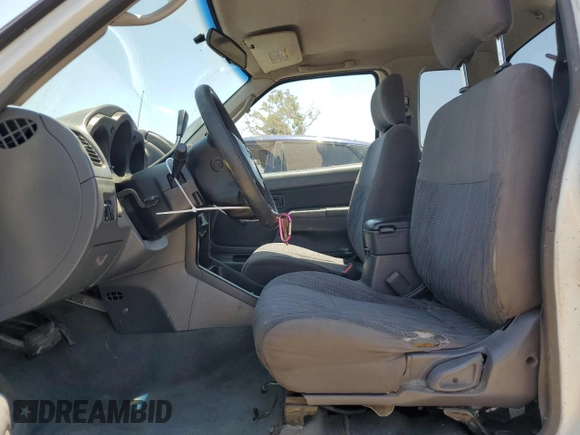 2003 Nissan Frontier XE with VIN 1N6DD26T73C425850, listed as a Copart auction lot 63330345 with 246,140 mi miles and Salvage title. Bid and sale history available at DreamBid. Image 7.