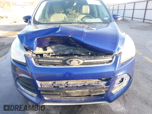 2014 Ford Escape Titanium with VIN 1FMCU9JX4EUD30964, listed as a IAAI auction lot 41772153 with 179,481 mi miles and . Bid and sale history available at DreamBid. Image 6.