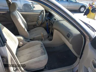 1999 Toyota Corolla VE z VIN 1NXBR18E6XZ225512, wystawiony jako IAAI lot #41842023 z przebiegiem 324 718 mil mil oraz . Historia ofert i sprzedaży dostępna na DreamBid. Obrazek 5.