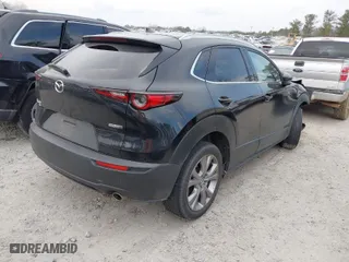 2021 Mazda CX-30 Premium with VIN 3MVDMBDL1MM306485, listed as a IAAI auction lot 41511194 with 44,114 mi miles. Bid and sale history available at carsss.com. Image 4.